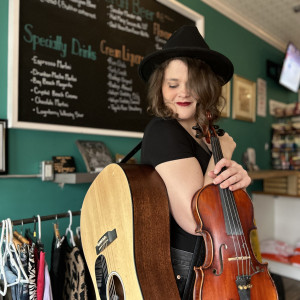 Ally Bazely Sings - Singing Guitarist / 1990s Era Entertainment in Thorold, Ontario