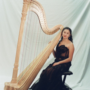 Bella the Harpist