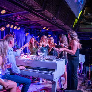 Dueling Pianos® Official - Dueling Pianos / Corporate Event Entertainment in Denver, Colorado
