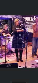 Gallery photo 1 of Highland Bagpiper