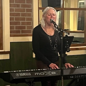 Lena K - Singer/Songwriter / Singing Pianist in Pine, Colorado