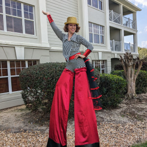 Long Legs Red - Stilt Walker in College Station, Texas