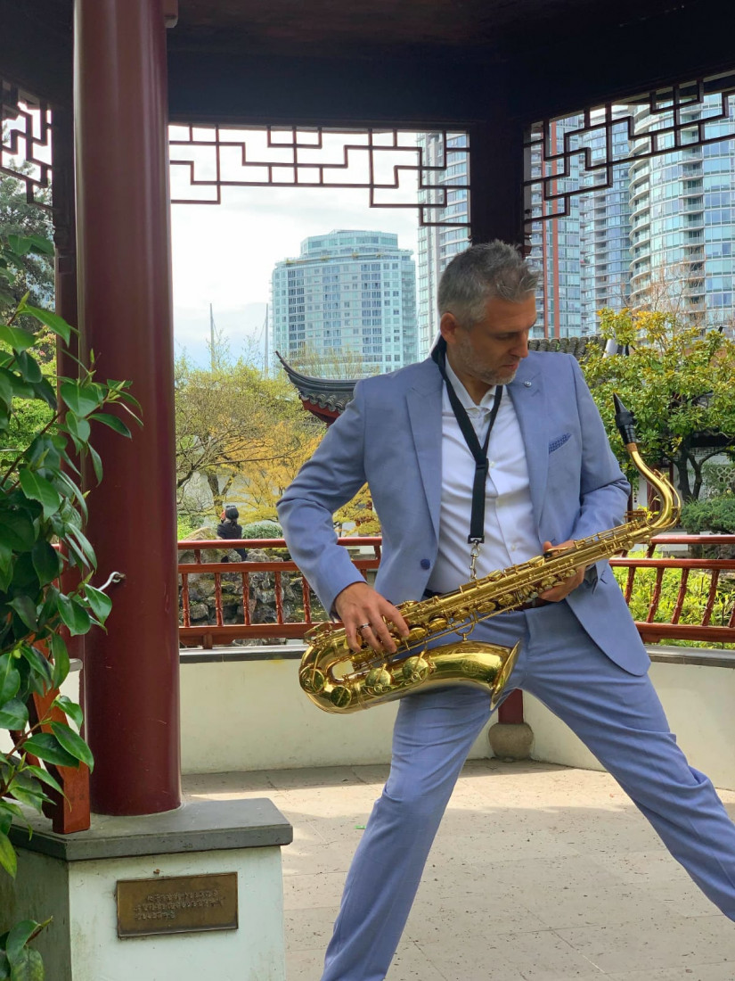 Hire The Sax Wears a Suit Saxophone Player in Vancouver, British Columbia
