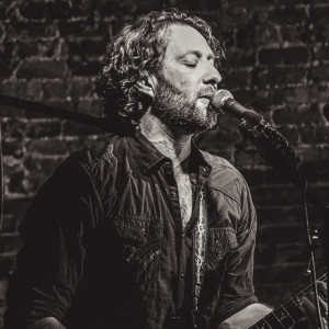 Urbane Coyote - Singing Guitarist / Singer/Songwriter in Aspen, Colorado