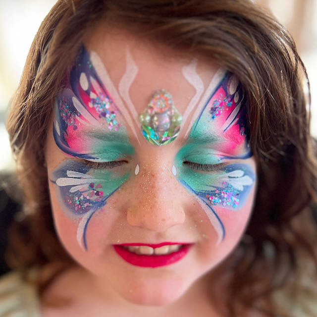 Gallery photo 1 of Wild Raspberry Face Painting